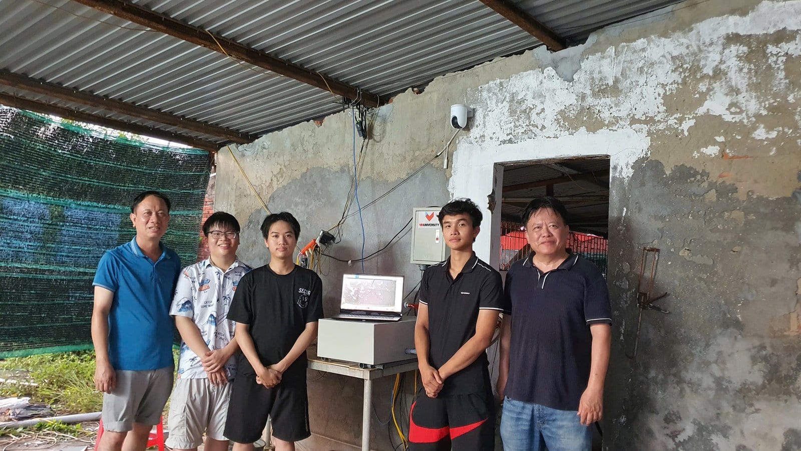 Team members completing installation of IoT monitoring equipment at RIA 1